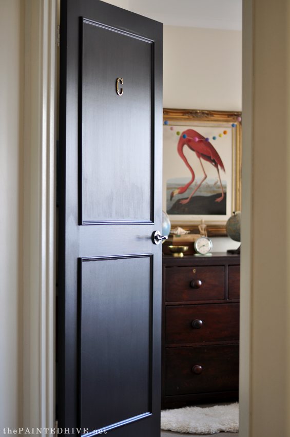Door Makeover with Trim and Black Paint